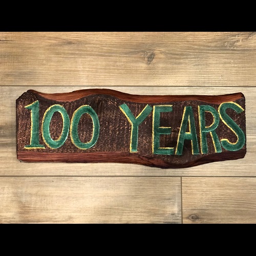 Signage 100 Year Celebration - Event Rentals - hand painted 100 years signage for rent